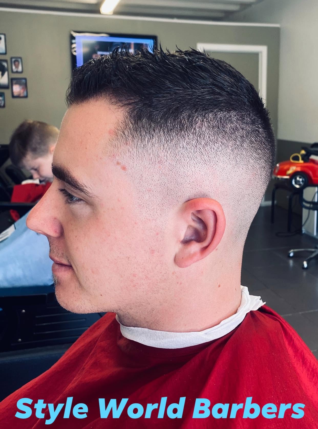 Men's high skin fade at Style World Barbers Engadine